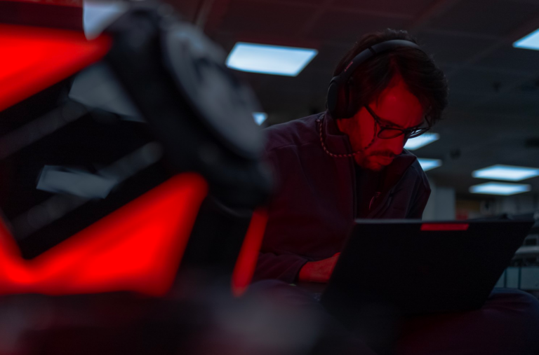 Scientist monitoring mission data in NRV Alliance's onboard laboratory, Arctic, July 2025